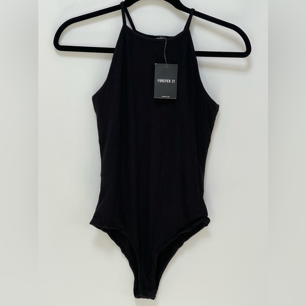 Woman’s black bodysuit
